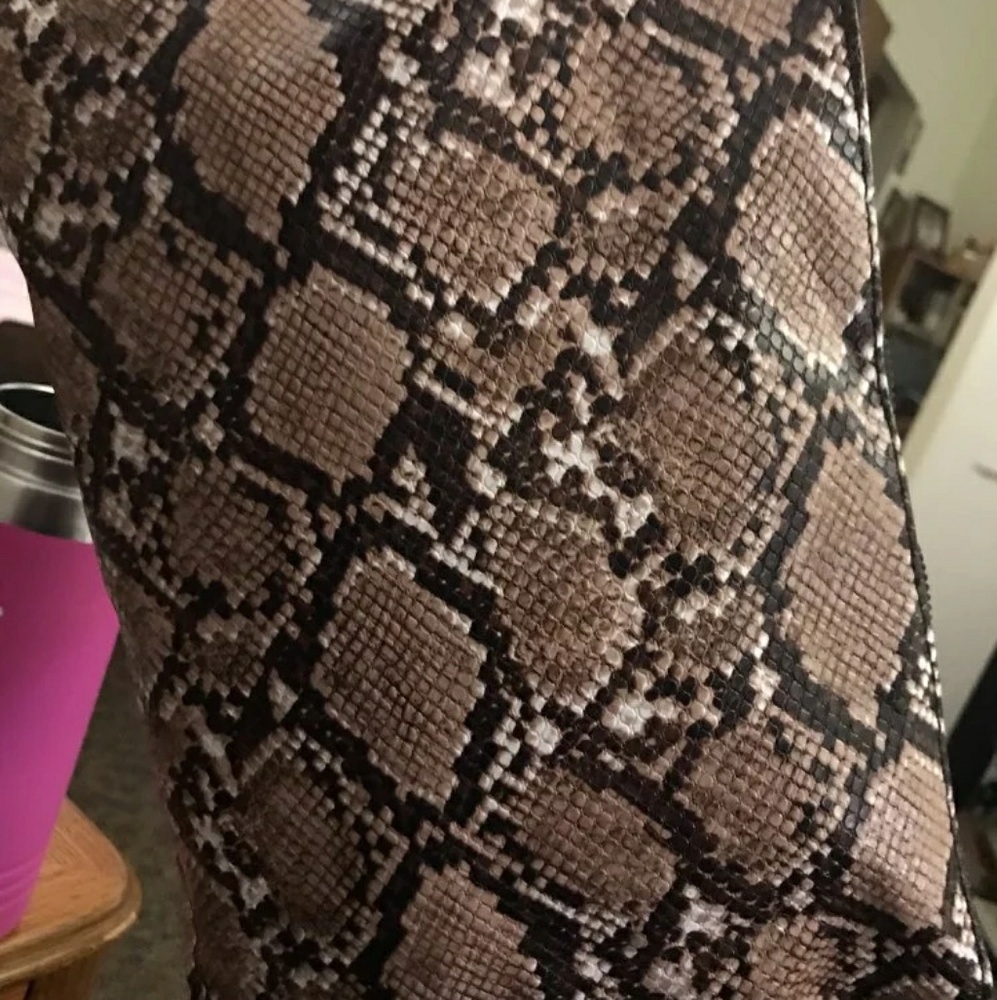 Snake print PU leather clutch
